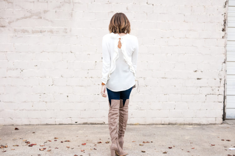 Nude ruffle back sweater paired perfectly with jeans and OTK boots or distressed denim and booties.