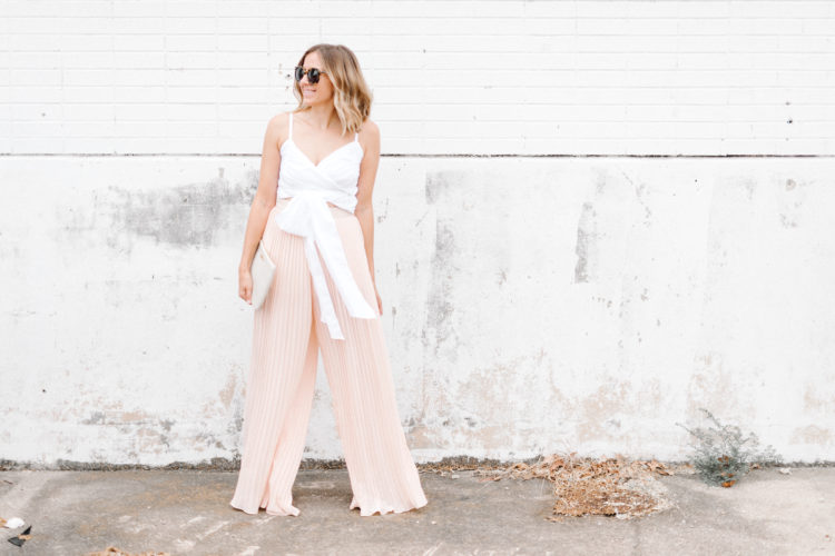 A feminine take on the wide leg pants trend with billowy blush pants and a bow tie top.