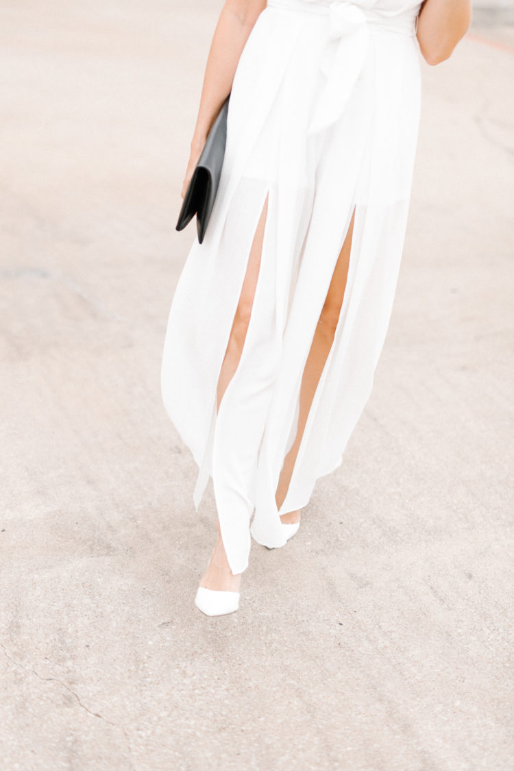 Elevate your black and white look with a sleek split leg jumpsuit. If white isn't your thing, this jumpsuit comes in green, yellow, and pink!