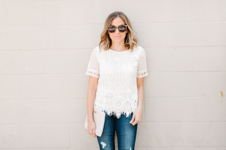 A feminine take on your traditional fall uniform - cut out booties, step hem jeans, and a white lace top.