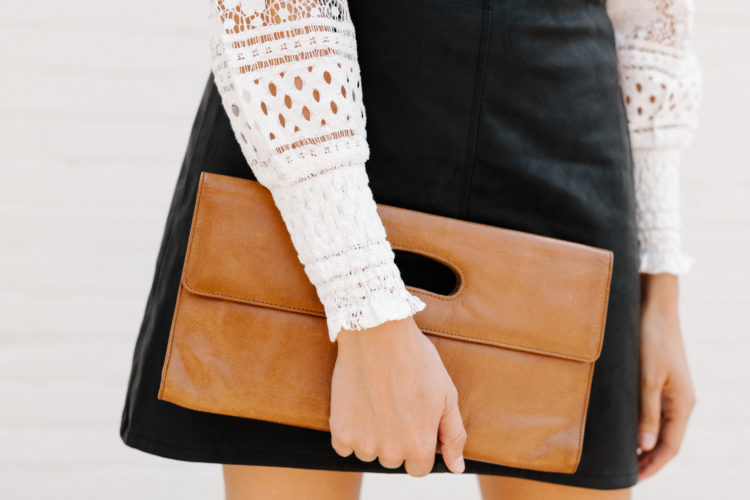 Stay chic this fall in an affordable leather jumper. A leather jumper is a statement in and of itself and can be layered over a tee, a sweater, or a blouse!