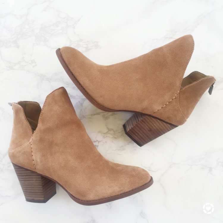 Make a statement with your brown booties by opting for a pair with a cutout detail.