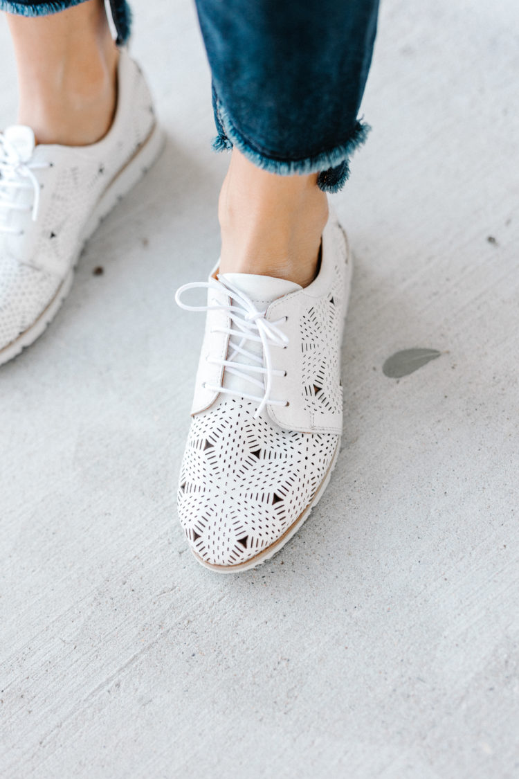 Sometimes making a statement happens at the ground level. Add a chic element to your outfit by adding some fashion for your feet. These leather white sneakers are both chic and functional!