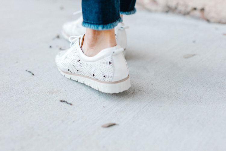 Sometimes making a statement happens at the ground level. Add a chic element to your outfit by adding some fashion for your feet. These leather white sneakers are both chic and functional!