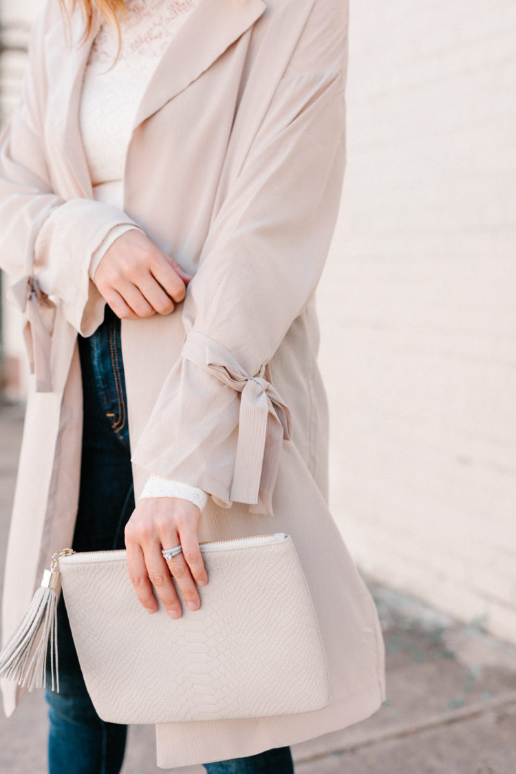 The two things you need this winter - a warm crockpot meal and a lightweight trench coat. This trench coat as the cutest tie sleeve detail sure to make a statement wherever you go!