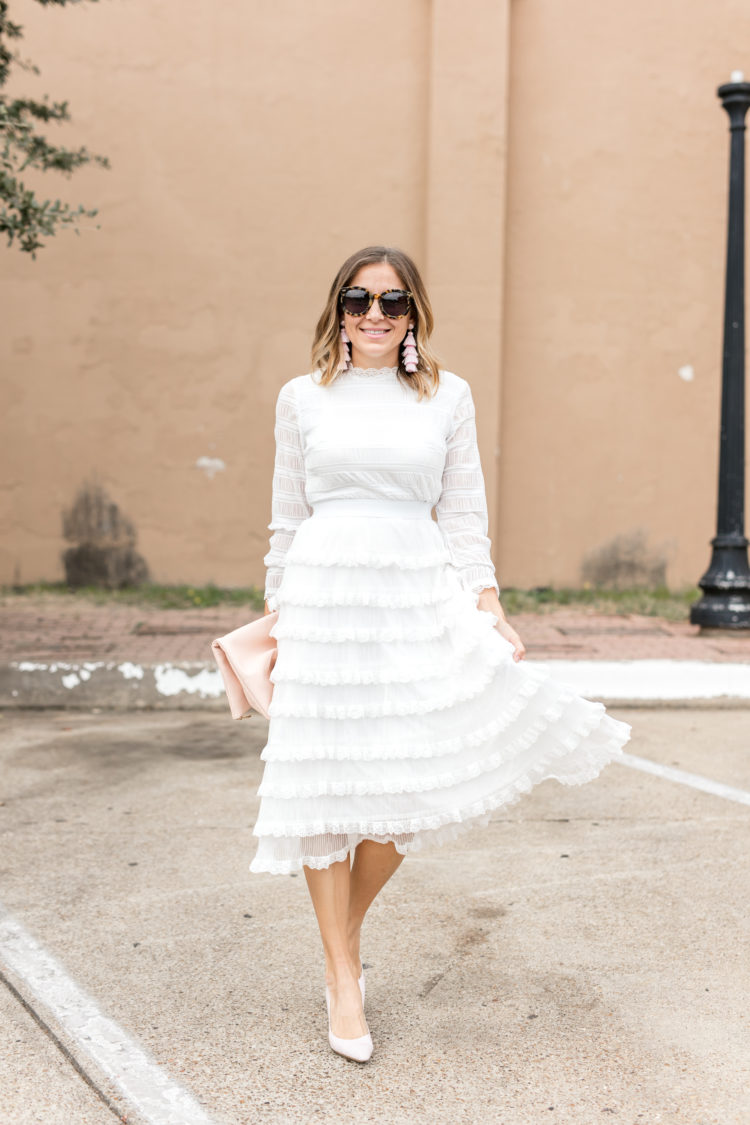 Stand out this winter in a winter white tiered dress that's both flattering and affordable!