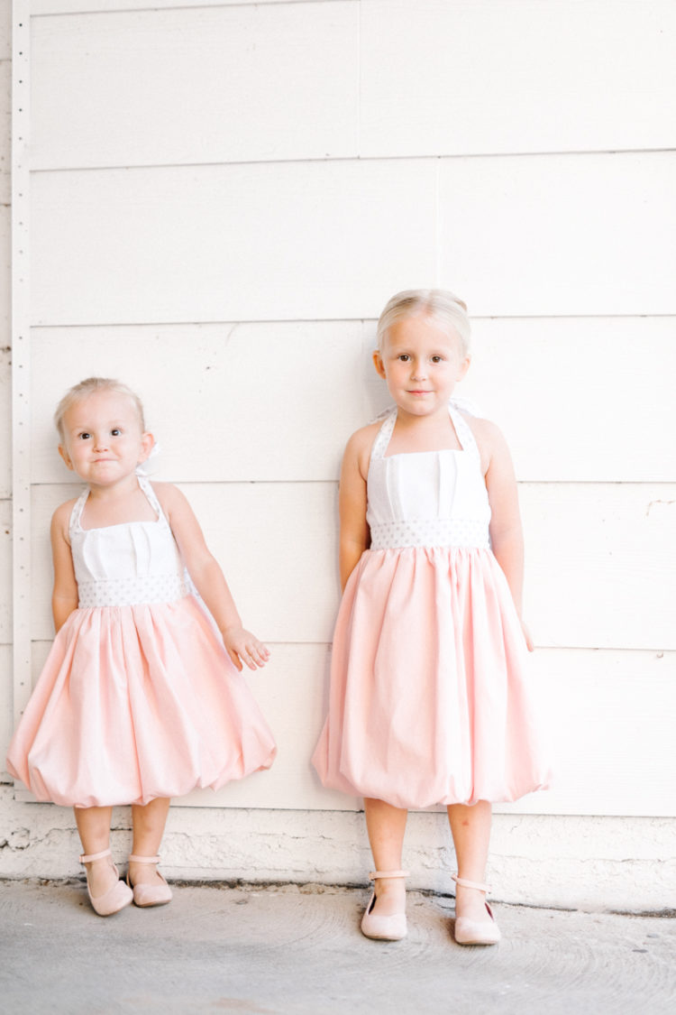 Shop small this year with these adorable, hand-made halter dresses that are perfect as is and even cuter layered under a faux fur jacket!