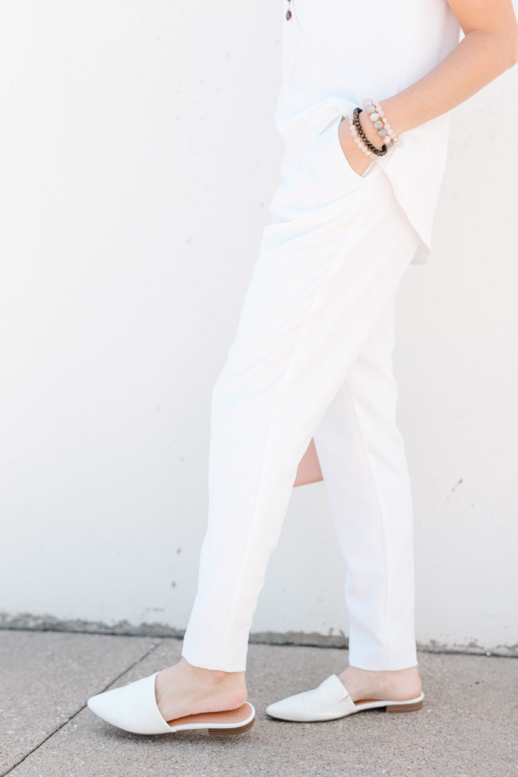 women sleeveless white jumpsuit